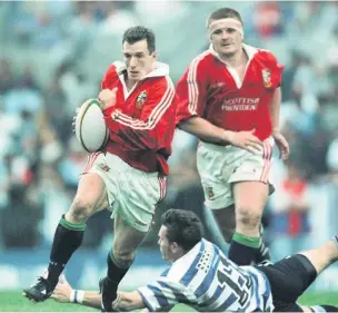  ??  ?? Howley in action for the Lions in South Africa in 1997