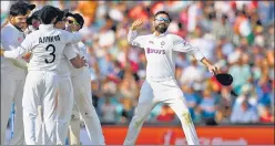  ?? AFP ?? Captain Virat Kohli (right) and the Indian team celebrate a wicket on the fifth day of the fourth Test at the Oval in London on Monday.