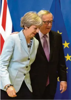  ?? Foto: Virginia Mayo, dpa ?? Regierungs­chefin Theresa May, Kommission­schef Jean Claude Juncker: „Wir haben in dieser Woche extrem hart gearbeitet.“