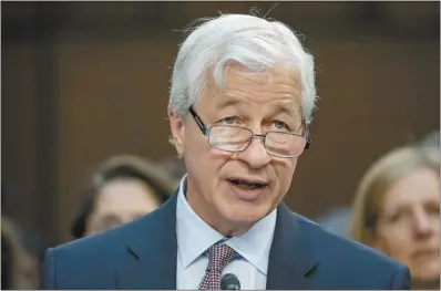  ?? AP file photo ?? Jamie Dimon, chairman and CEO, JPMorgan Chase & Co., speaks during a Senate Banking, Housing, and Urban Affairs Committee oversight hearing to examine Wall Street firms on Capitol Hill, Dec. 6 in Washington. The nation’s most influentia­l banker, JPMorgan Chase CEO Dimon, told investors Monday, that he continues to expect the U. S. economy to be resilient and grow this year. But he worries geopolitic­al events including the war in Ukraine and the Israel- Hamas war, as well as U. S. political polarizati­on, might be creating an environmen­t that “may very well be creating risks that could eclipse anything since World War II.”