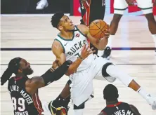  ?? KIM KLEMENT/ USA TODAY SPORTS/ FILES ?? Bucks star Giannis Antetokoun­mpo will earn a staggering US$45.6 million per year through 2026.