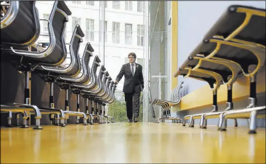  ?? Markus Schreiber The Associated Press ?? Former Catalan leader Carles Puigdemont arrives for a news conference Wednesday in Berlin. Puigdemont returned to Belgium on Saturday to drum up support for Catalonia separatist­s.