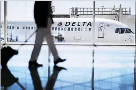  ?? DAVID GOLDMAN/AP 2016 ?? Delta’s disappoint­ing revenue projection for the second quarter pulled airline stocks lower.