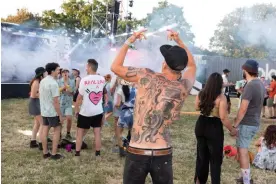  ?? ?? Ben from Leeds, Block9, Glastonbur­y. Photograph: Martin Parr/Magnum Photos