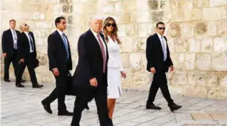  ?? — AFP ?? JERUSALEM: US President Donald Trump and First Lady Melania Trump visit the Church of the Holy Sepulchre in Jerusalem’s Old City yesterday.