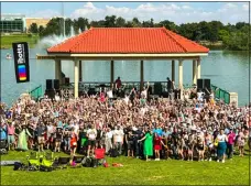  ?? PHOTO PROVIDED BY IBOTTA ?? Ibotta employes celebrate at the company picnic at Denver’s City Park. The company went public on Thursday night, raising $ 577 million.