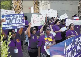  ?? Erik Verduzco ?? Las Vegas Review-journal @Erik_verduzco Service Employees Internatio­nal Union Local 1107 members protest Wednesday outside Southern Nevada Regional Housing Authority’s administra­tive offices.