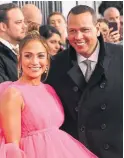 ?? NICHOLAS HUNT GETTY IMAGES ?? Jennifer Lopez says she and her beau, Alex Rodriguez, are in “a place where we feel like a real family.”