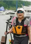 ?? ?? Naomi Herman, a breast cancer survivor, prepares to load a boat at Fox Chapel Yacht Club in O’Hara.