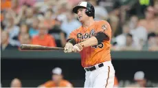  ?? GAIL BURTON/THE ASSOCIATED PRESS ?? Since the all-star game, Baltimore Orioles outfielder Mark Trumbo has put together just eight hits and two homers in 48 at-bats — while the Orioles have gone 7-7.