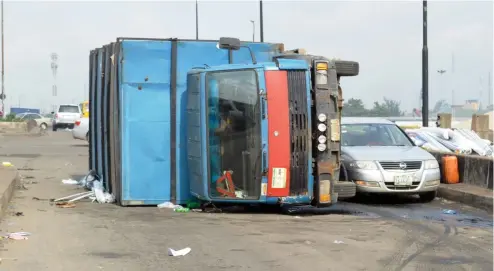  ?? Photo: NAN ?? An Accident scene at the Orile- Iganmu Bridge in Lagos yesterday