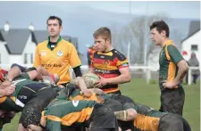  ??  ?? Scrum half Ryan Feehily in action.