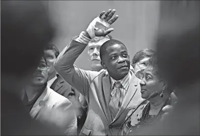  ?? Associated Press ?? ■ James Shaw Jr. waves to the crowd and legislator­s Tuesday as he is honored for disarming a shooter inside a Nashville-area Waffle House at the Tennessee State House.