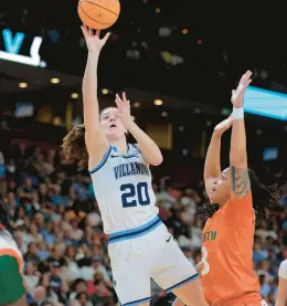  ?? CHARLES FOX/THE PHILADELPH­IA INQUIRER ?? Villanova’s Maddy Siegrist shoots under pressure from Miami’s Destiny Harden on Friday in Greenville, S.C..