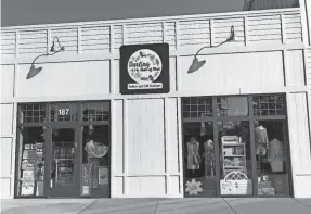  ?? BEN TOBIN/COURIER JOURNAL ?? Jen Neutz opened Darling State of Mind's first store at 1321 Herr Lane #187 in the Westport Village shopping center in 2016.