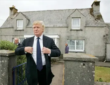  ??  ?? Back to his roots: Trump pictured in 2008 outside the cottage in Tong, on the Isle of Lewis, where his mother was brought up Sporting snap (right): Looking the part with second wife Marla Maples at a New York Yankees baseball game in 1992