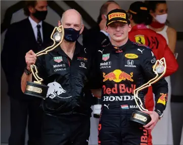  ?? (Photos Jean-François Ottonello) ?? Ce premier triomphe à Monaco, Max Verstappen l’a célébré sur le podium princier en compagnie d’Adrian Newey, l’emblématiq­ue concepteur des Formule  griffées Red Bull.