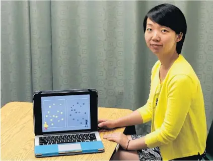  ?? CAITLIN FAW/BALTIMORE SUN ?? Johns Hopkins doctoral candidate Jinjing “Jenny” Wang says her research supports the notion that “we can change children’s math performanc­e by working with their intuitive number sense — a capacity each of us is born with, not something we have to...