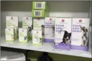  ?? ANDREW SELSKY — THE ASSOCIATED PRESS ?? Marijuana products for dogs are lined up on a shelf in the Bend Veterinary Clinic in Bend, Ore.