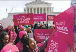  ?? Jose Luis Magana Associated Press ?? ABORTION RIGHTS activists rally Tuesday outside the high court as it weighs challenges to Food and Drug Administra­tion approval of an abortion medication.
