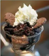  ?? PHOTO COURTESY OF TUBBY ROBOT ICE CREAM FACTORY ?? Love Thin Mints? Try a Cookie Season sundae.