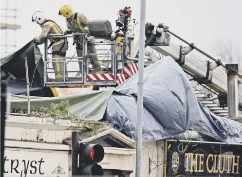  ?? PICTURE: JEFF J MITCHELL/GETTY IMAGES ?? Ten people died when a police helicopter crashed into the roof of Glasgow’s Clutha bar four years ago