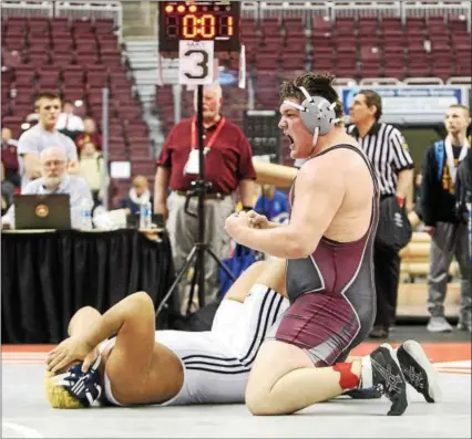  ?? ROD JAMES - FOR DIGITAL FIRST MEDIA ?? Brandywine Heights’ Michael Hubble celebrates after pinning Wyomissing’s Deion Adams with one second remaining (5:59) to win the 285-pound title at the District 3 AA Championsh­ips on Feb. 25 in Hershey.