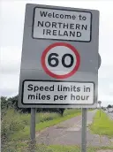  ??  ?? > Traffic currently passes freely across the border between the Republic of Ireland and Northern Ireland