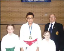  ??  ?? The Drogheda School of Karate contingent - Dearbhaile Nulty, Joseph Floyd and Kaiya Nulty with their instructor Philip Nulty.