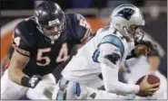  ?? THE ASSOCIATED PRESS ?? FILE - In this file photo, Chicago Bears’ linebacker Brian Urlacher (54) attempts to sack Carolina Panthers’ quarterbac­k Jake Delhomme.