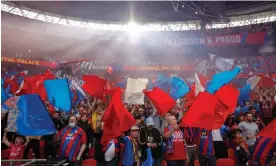  ?? Photograph: Tom Jenkins/The Guardian ?? Crystal Palace fans at last season’s FA Cup semi-final against Chelsea. The club had a turnover of just under £160m in 2021-22.