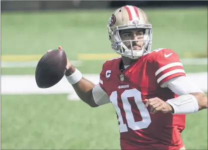  ?? BILL KOSTROUN — THE ASSOCIATED PRESS ?? 49ers quarterbac­k Jimmy Garoppolo throws a pass during the first half Sunday against the New York Jets in East Rutherford, N.J.