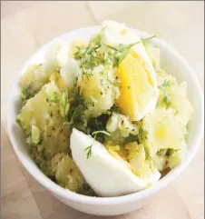 ?? Photo by Cynthia Nelson ?? Warm potato salad with boiled eggs & mustard dressing
