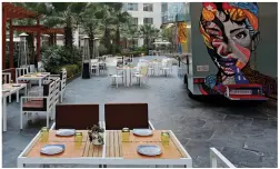  ??  ?? The alfresco dining area at Playground boasts a food truck