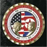  ?? DOUG MILLS NEW YORK TIMES ?? A coin commemorat­ing planned peace talks, issued by the White House Communicat­ions Agency, a military unit assigned to the president, features likenesses of President Donald Trump and Kim Jongun.