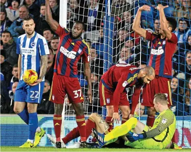  ??  ?? One up, man down: Ipswich call for aid after scorer Luke Chambers is injured BENNETT DEAN