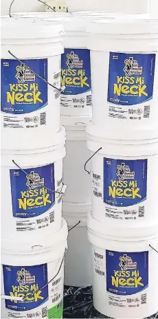  ?? CONTRIBUTE­D PHOTOS ?? The Kiss Mi Neck brand of pickled chicken neck produced by the Best Dressed Chicken is available only in the 5-gallon bucket size.