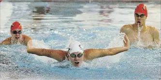  ?? CLIFFORD SKARSTEDT/EXAMINER FILE PHOTO ?? Trent Swim Club swimmer Rachel Chayer, centre, shown in a file photo taken during a practice last July, won eight medals including six gold and two silver for the Trent Swim Club in Guelph Dec. 8 and 9.