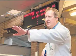  ?? Picture: Paul Smith. ?? An auctioneer leading bidding at Forfar Mart.