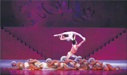 ?? PHOTOS PROVIDED TO CHINA DAILY ?? Modern expressive forms such as ballet are used in the acrobatic performanc­es, which tell dramatic stories about the civilizati­on in Sichuan as it was some 3,000 years ago. Zhou Xiaoheng, head of Deyang Acrobatic Troupe