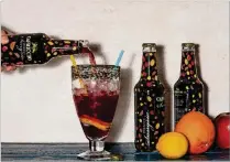  ?? PHOTO BY GORAN KOSANOVIC FOR THE WASHINGTON POST ?? Capriccio sangria, the “it” drink of summer, is a blend of fruit juice and carbonated wine. People on social media are calling it “Fancy Four Loko,” which was banned from several states because of its potency.