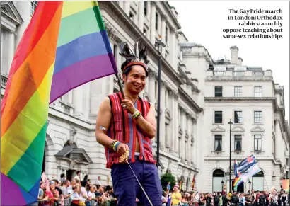  ?? PHOTO: GETTY IMAGES ?? The Gay Pride march in London: Orthodox rabbis staunchly oppose teaching about same-sex relationsh­ips