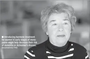  ?? Dreamstime/TNS ?? Introducin­g hormone treatment for women in early stages of menopause might help decrease their risk of dementia or Alzheimer’s disease.