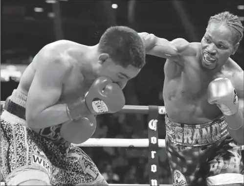  ?? Photo: VCG ?? Shawn Porter (right) lands a right hand against Danny Garcia at Barclays Center in the Brooklyn borough in New York on Saturday.