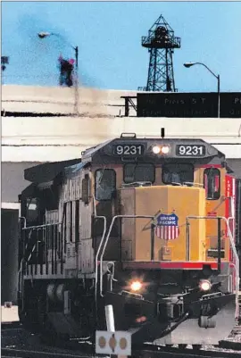  ?? Lawrence K. Ho
Los Angeles Times ?? A DIESEL LOCOMOTIVE in Long Beach. A bill backed by Sen. Kevin de León would ensure that a good chunk of cap- and- trade money is used in poor areas.