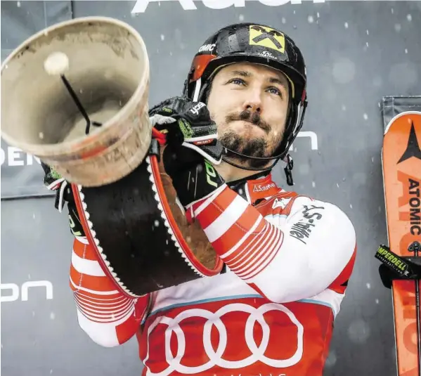  ?? BILD: SN/GEPA ?? An Kuhglocken und Weltcupsie­gen mangelt es ihm nicht: Marcel Hirscher gewann bereits zum neunten Mal in Adelboden.