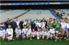  ??  ?? President of the GAA, Aogán Ó Fearghail, with players, coaches and mentors of the Connacht Boys and Girls teams which played in Croke Park.