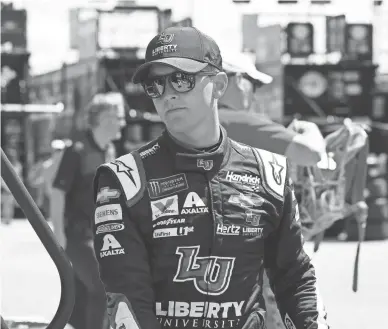  ?? MIKE DINOVO/USA TODAY SPORTS ?? William Byron looks on during practice Friday for the Consumers Energy 400 at Michigan Speedway. Byron, Kyle Busch and Bubba Wallace met with NASCAR officials over dust-ups at Watkins Glen.