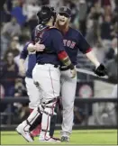  ?? AP photo ?? Craig Kimbrel (right) and Sandy Leon celebrate after the Red Sox defeated the Yankees 11-6 on Thursday.