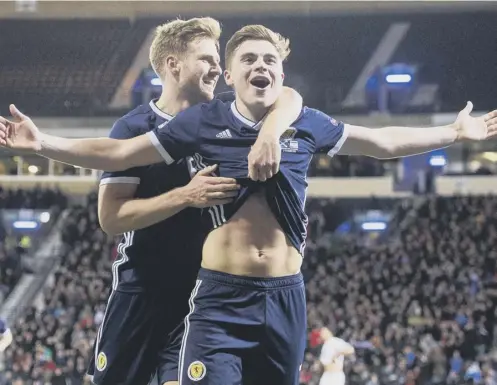  ??  ?? 0 James Forrest was the hero for Scotland, scoring a hat-trick in the 3-2 win over Israel.